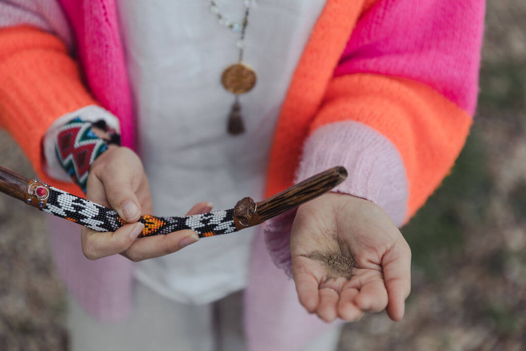 plant medicine healer doing rapé