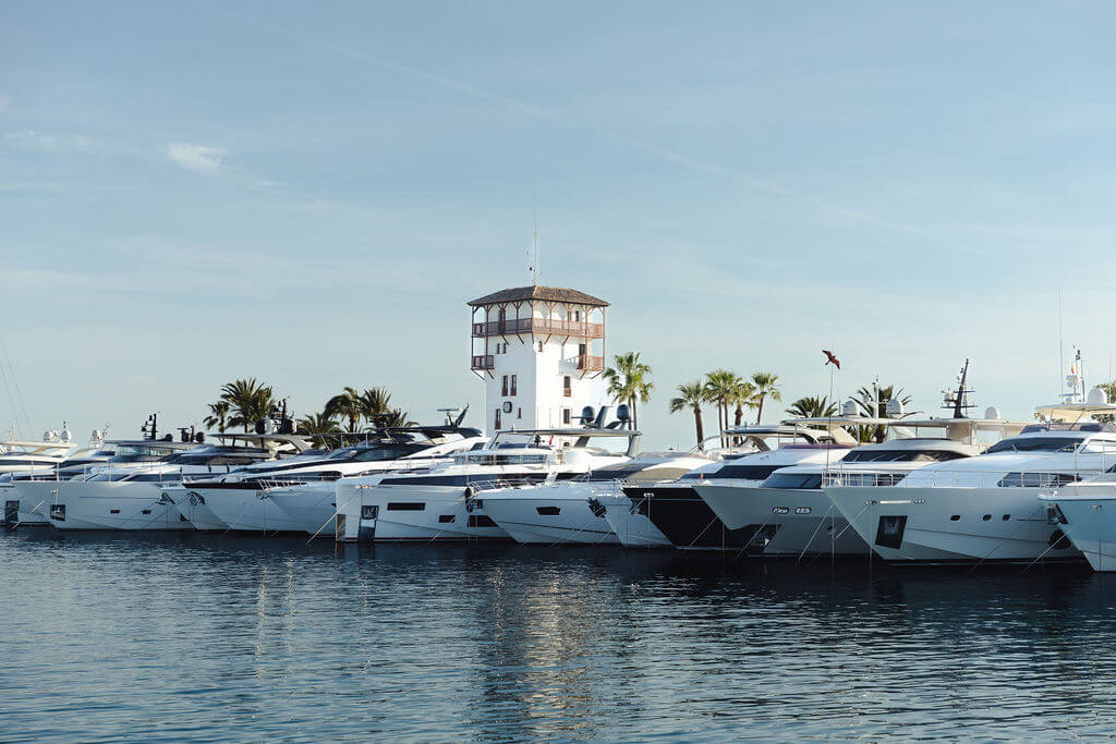 the marina of Portals Nous, yachts and a lighthouse 