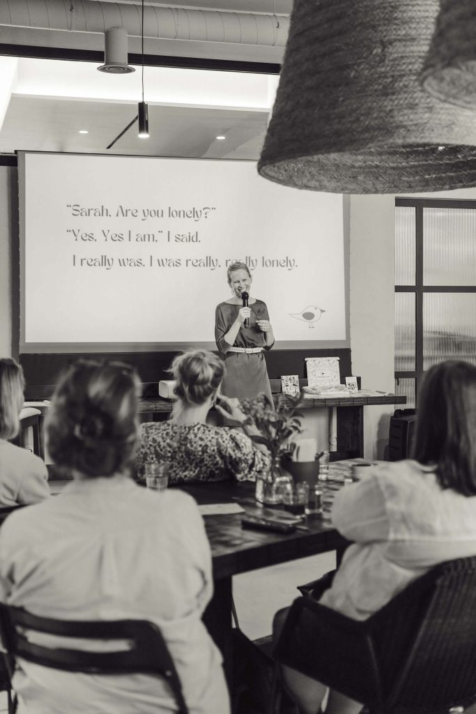 Sarah Oakley of Brave Bird Club giving a talk at Mallorca networking event Women in Business 