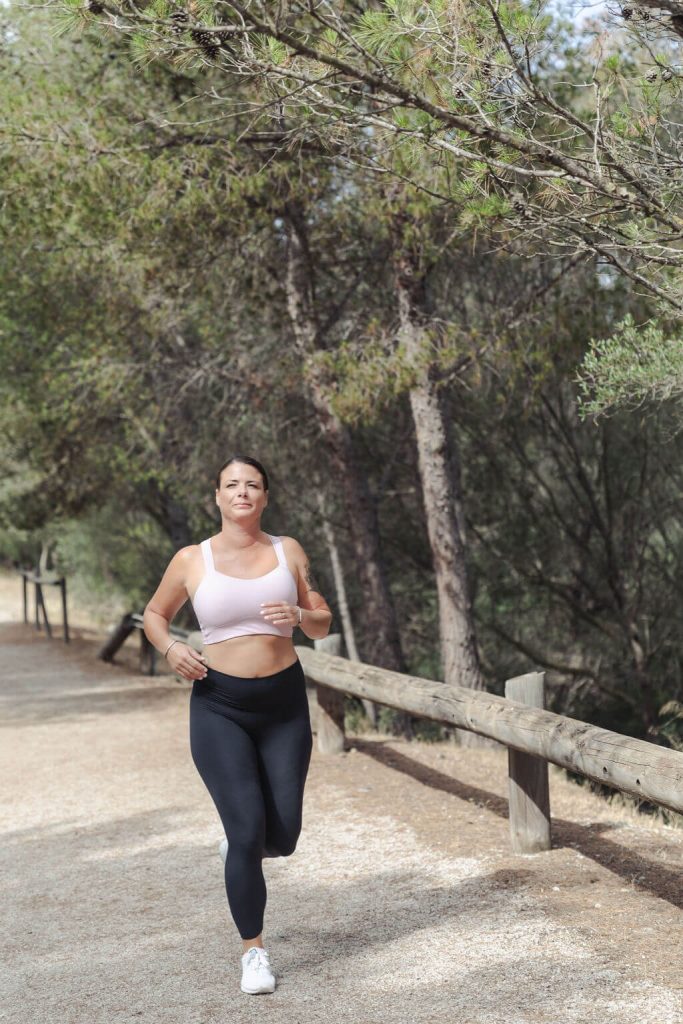 Belinda running in nature to show the importance of fresh air and exercise