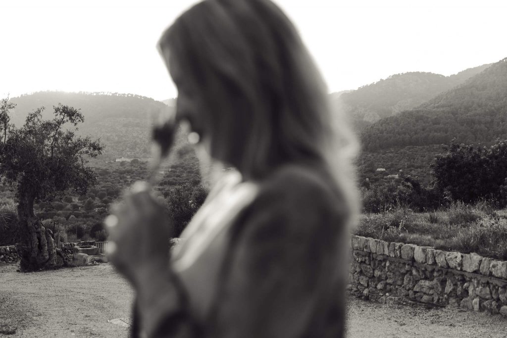 private chef Ida picking up local produce from garden during her personal branding shoot in Mallorca