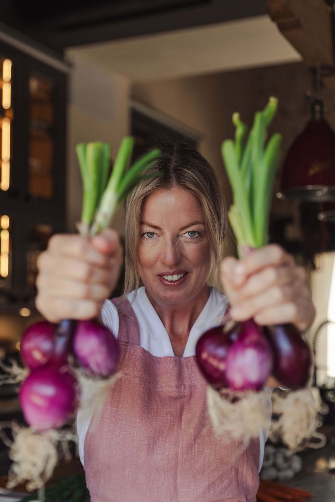 private chef Ida playing with food for fun personal branding shoot in Mallorca